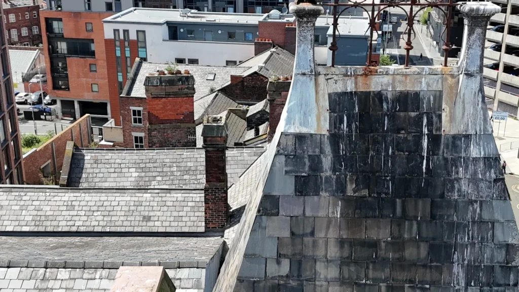 Lead and slate roof detail on a church building