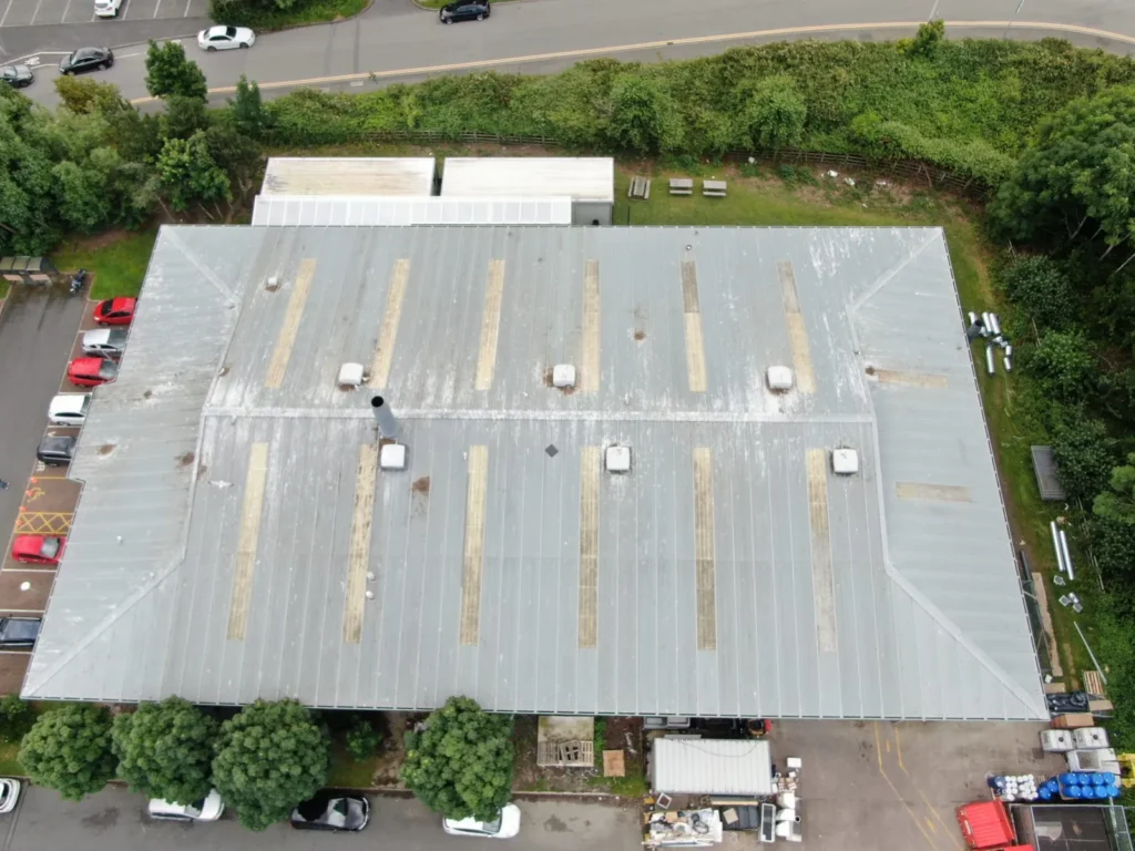 Overhead drone view of a commercial metal roof in North Wales
