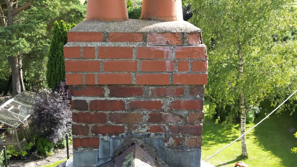 Drone roof survey in North Wales: brick chimney stack with two clay pots