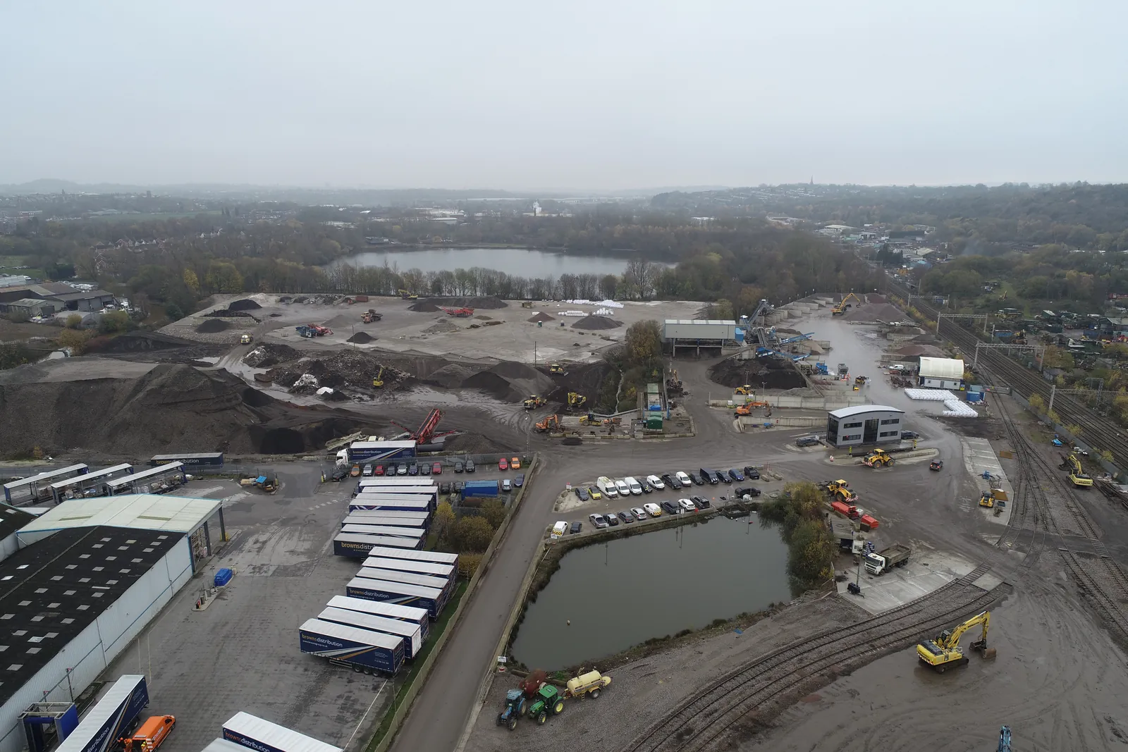 Aerial view of site clearance works next to warehouses