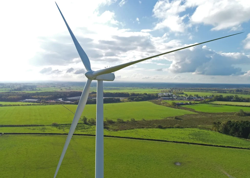 Drone view of a wind turbine nacelle and blades